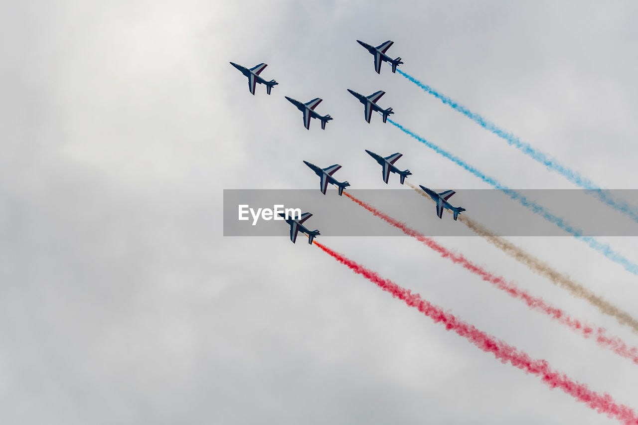 LOW ANGLE VIEW OF AIRSHOW IN SKY