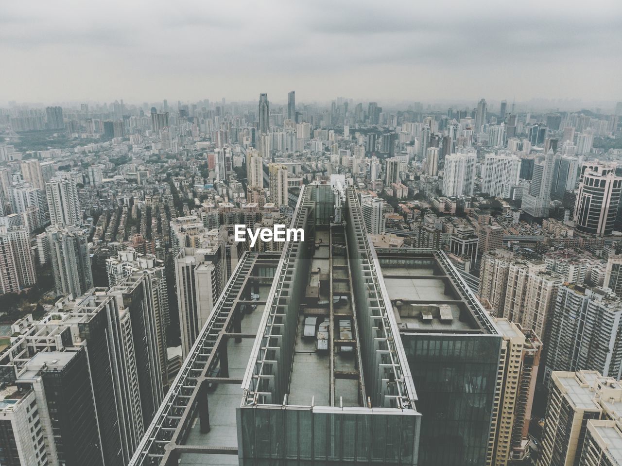 HIGH ANGLE VIEW OF CITY BUILDINGS AGAINST SKY