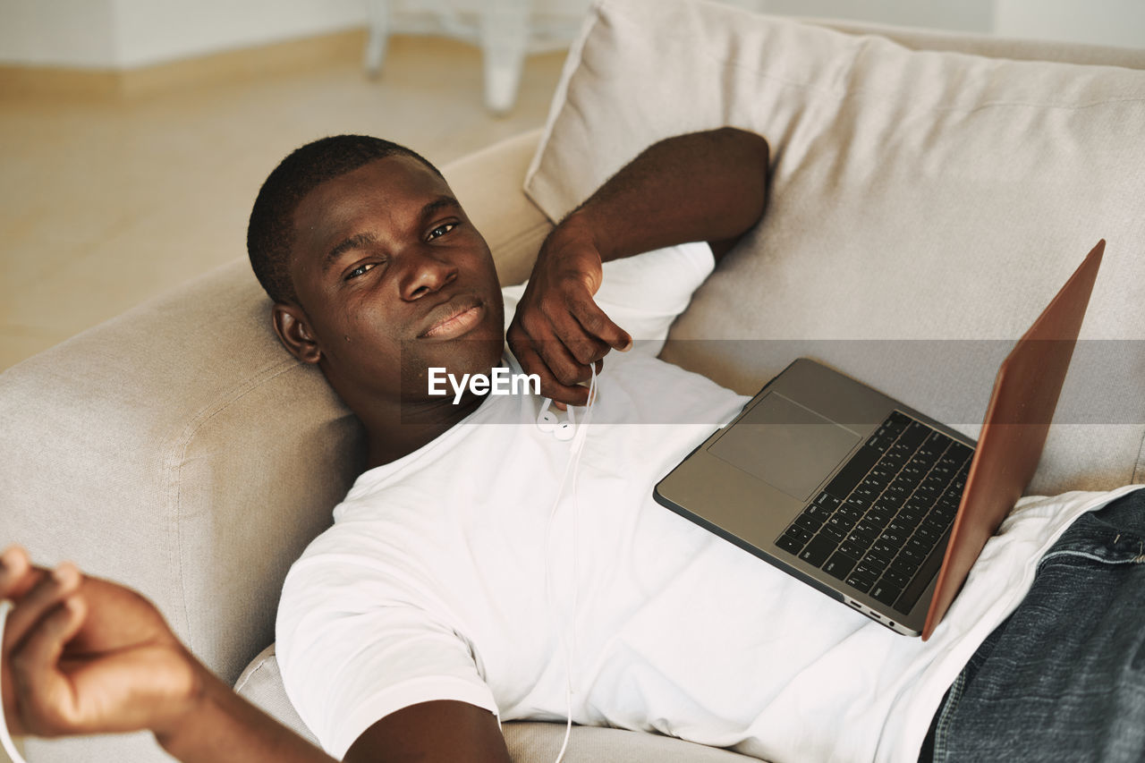 High angle view of man using mobile phone