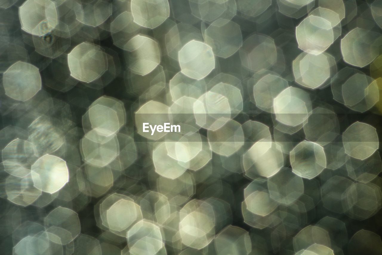 Defocused image of illuminated lights at night