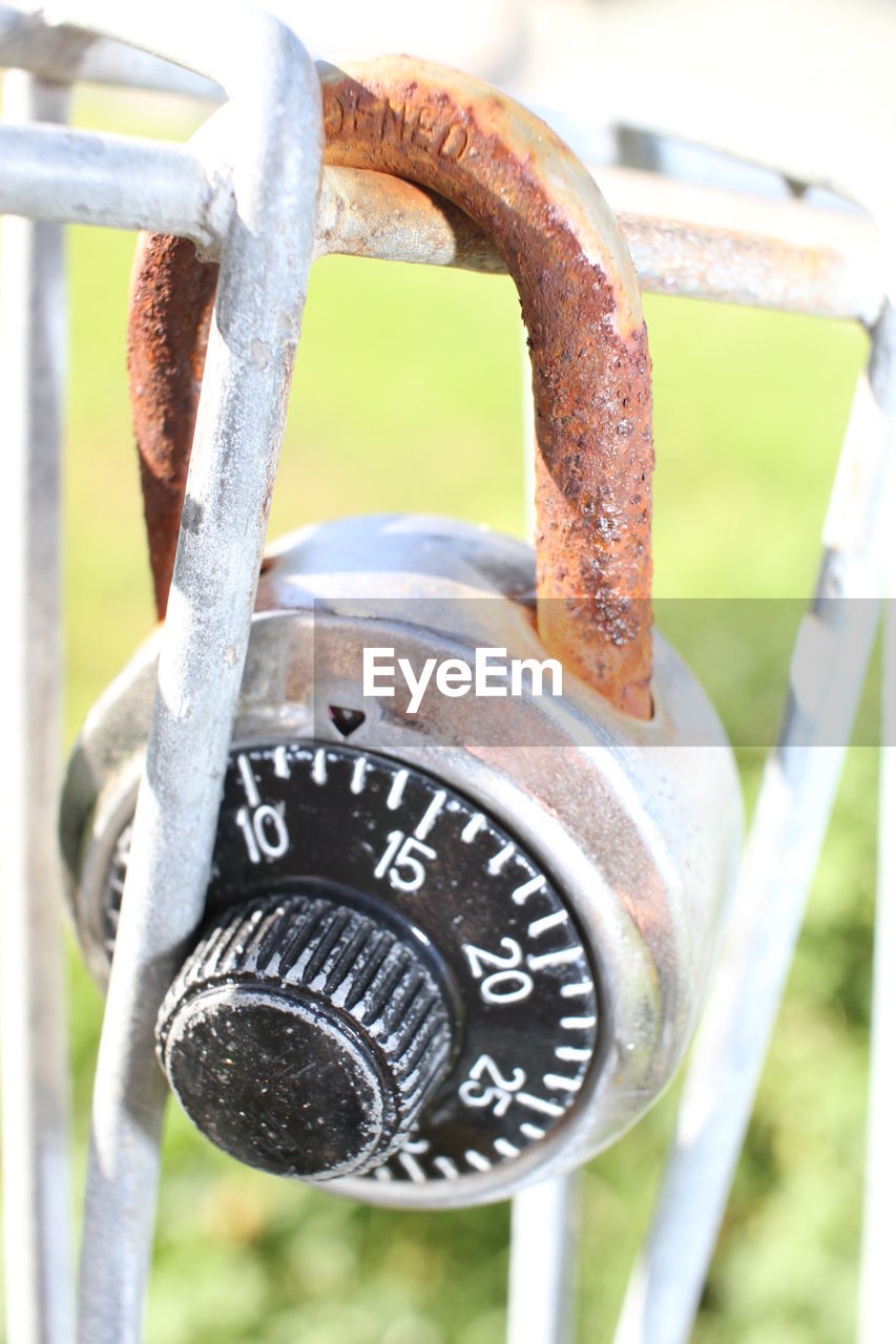 CLOSE-UP OF PADLOCKS