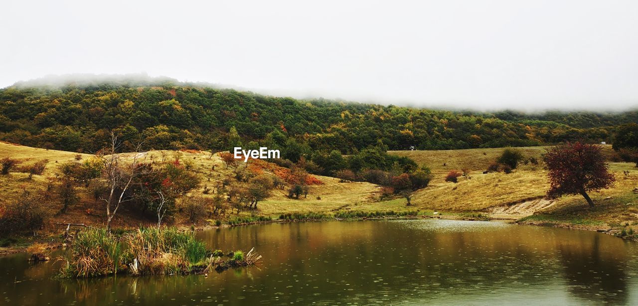 Scenic view of lake against clear sky