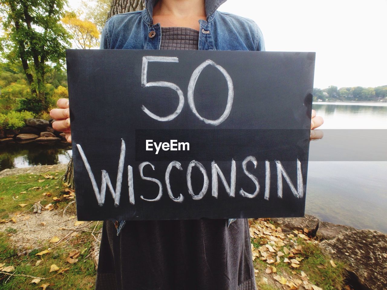 Woman holding sign '50 wisconsin'