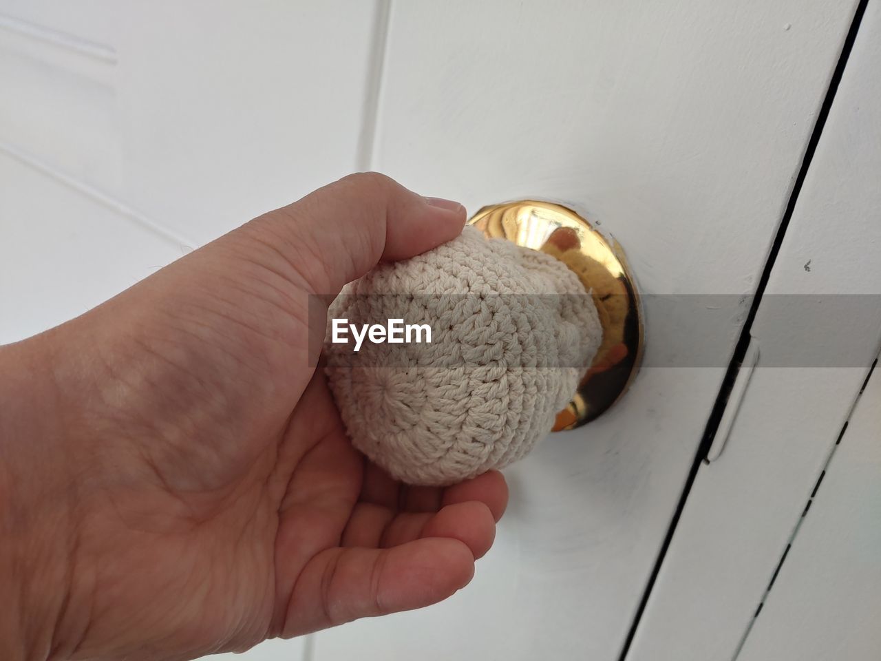 HIGH ANGLE VIEW OF PERSON HOLDING ICE CREAM IN PLATE
