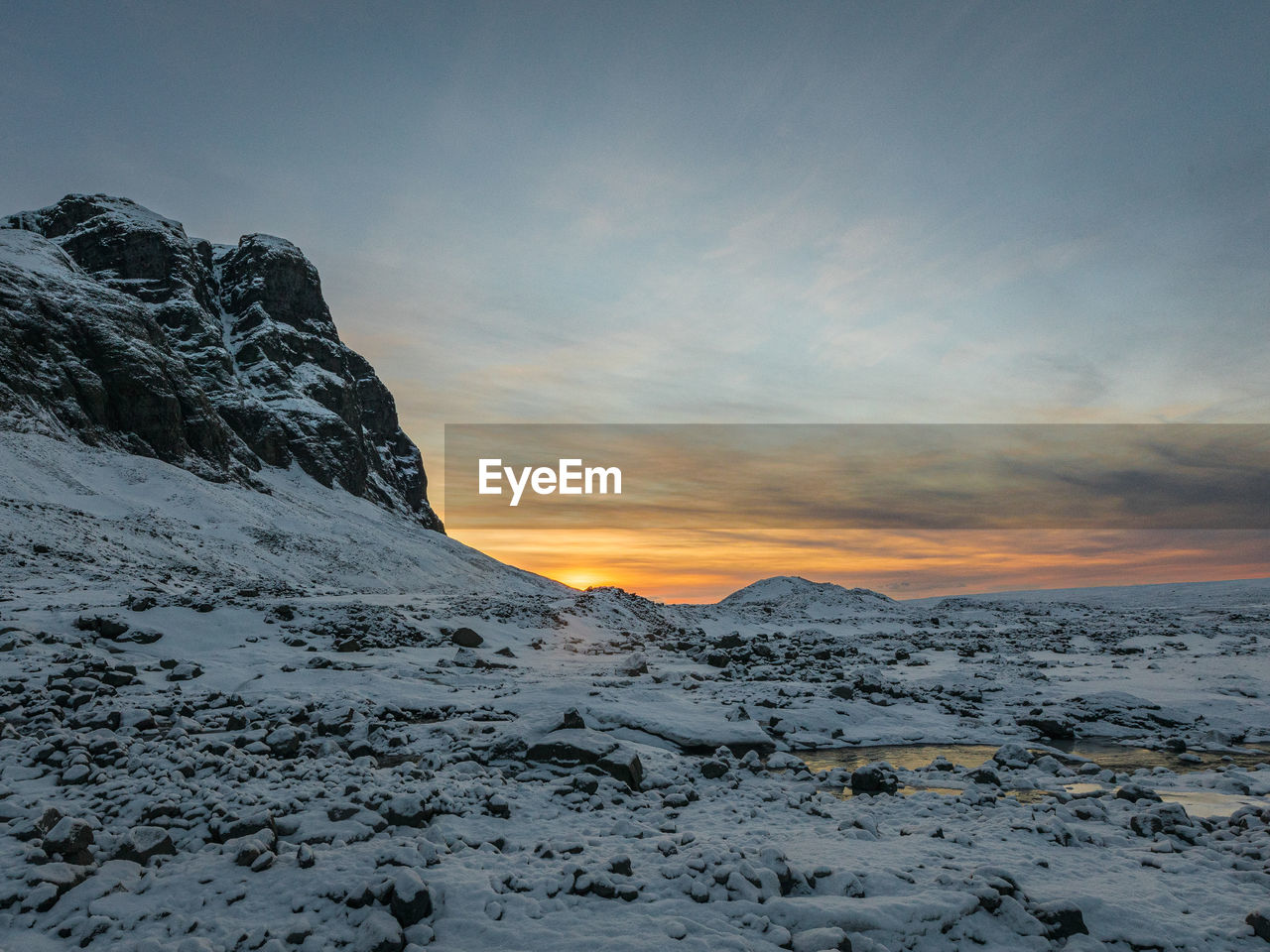 Scenic view of snow covered mountains against sky during sunrise, in iceland