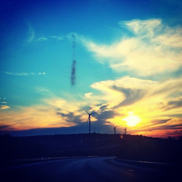 VIEW OF ROAD AT SUNSET