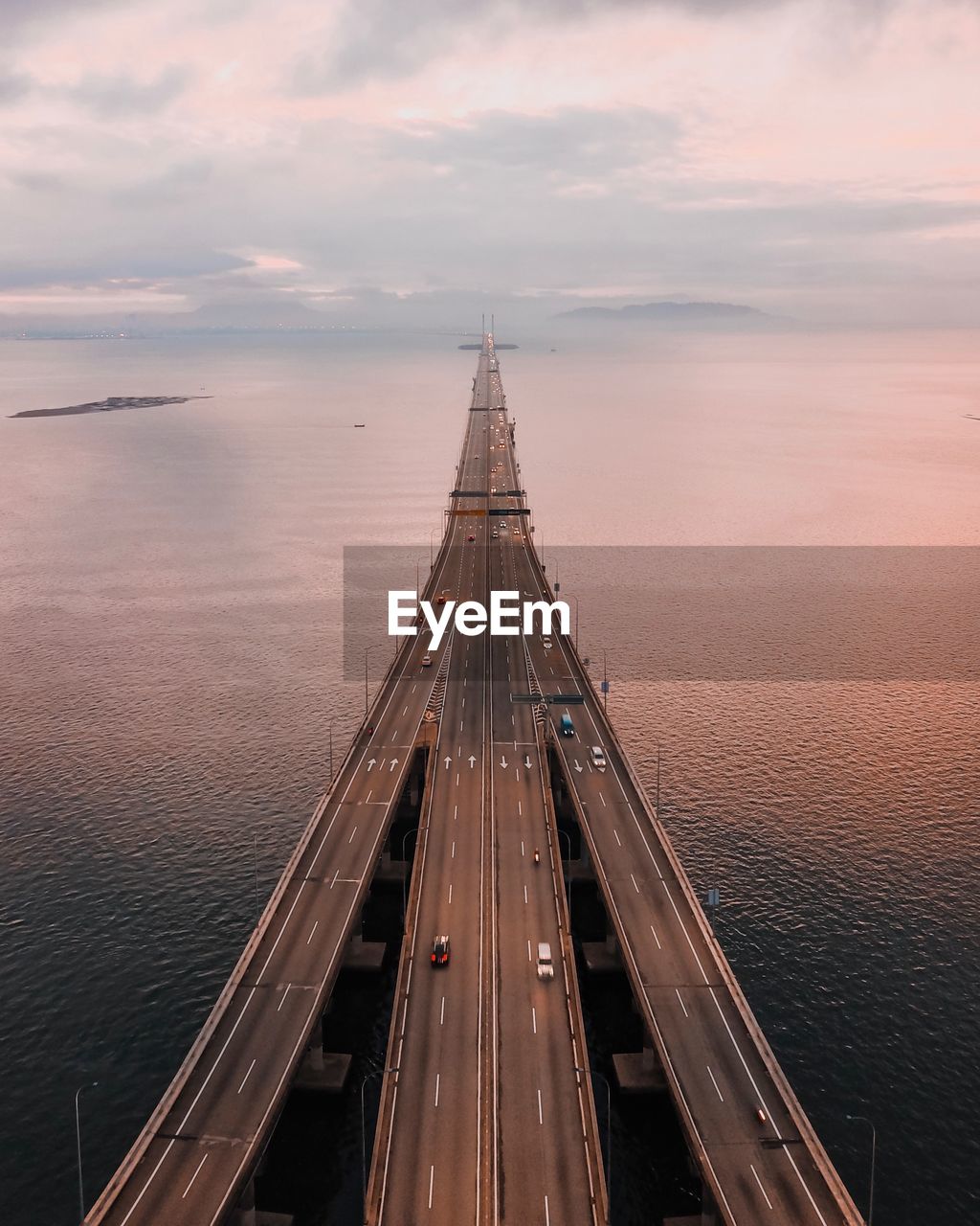 High angle view of bridge over sea during sunset
