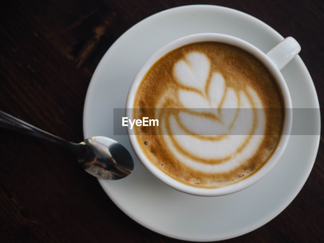 Close-up of cappuccino on table