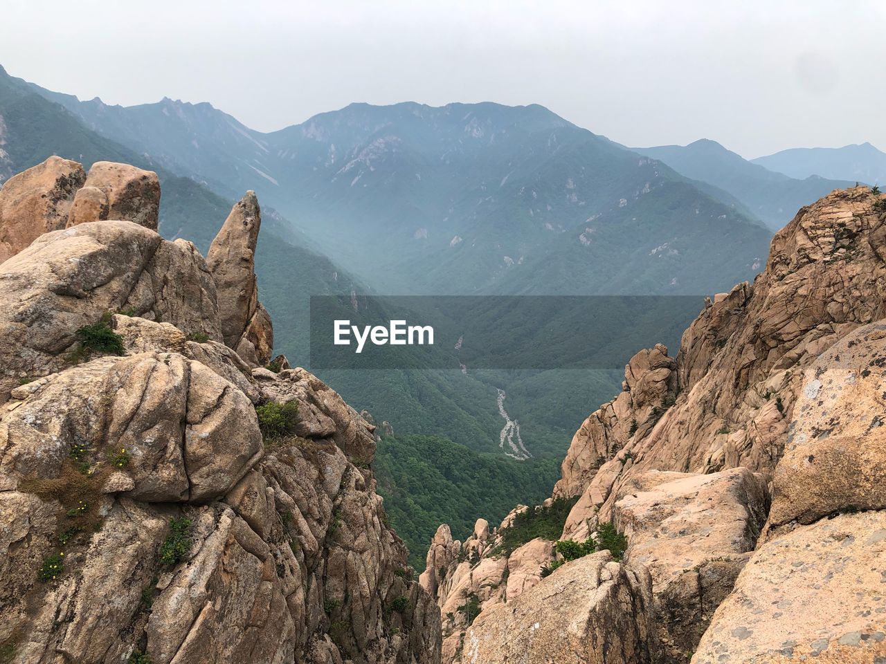 Scenic view of rocky mountains against sky