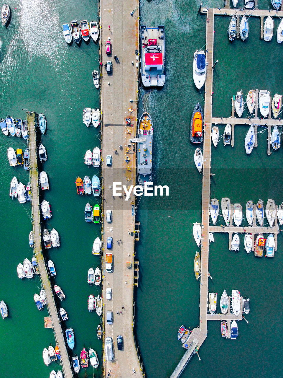 High angle view of boats moored at harbor