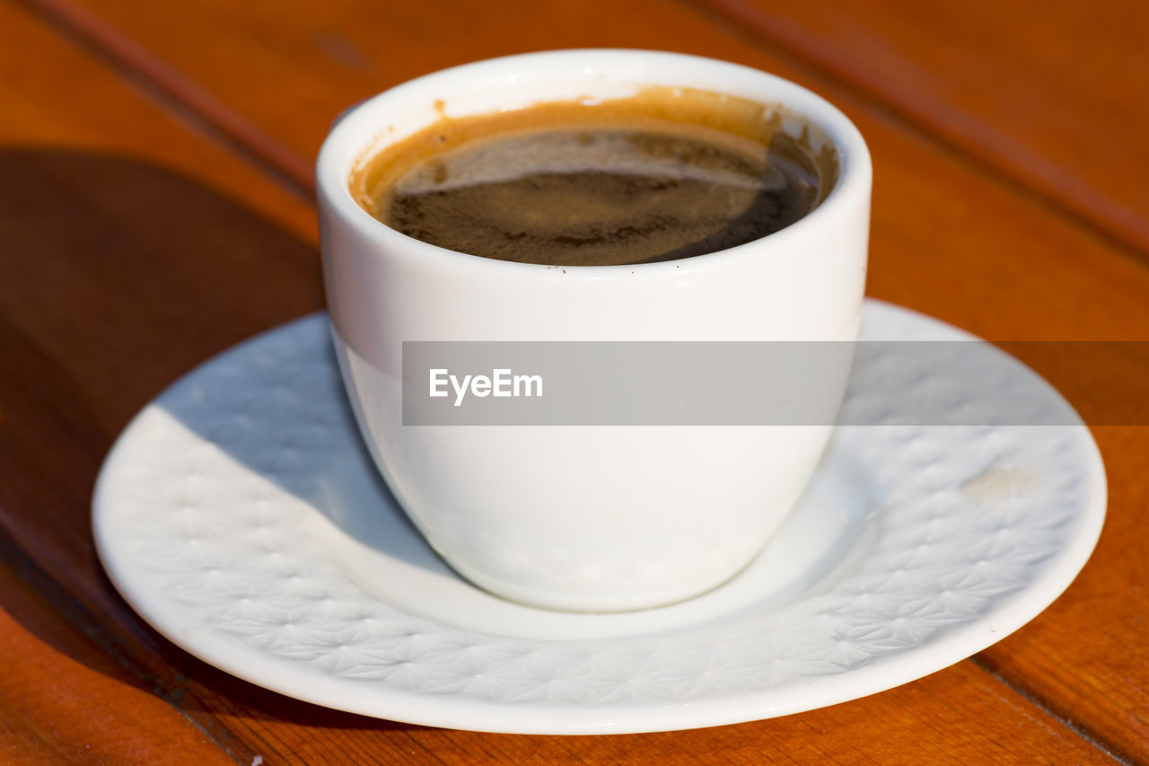 HIGH ANGLE VIEW OF COFFEE CUP
