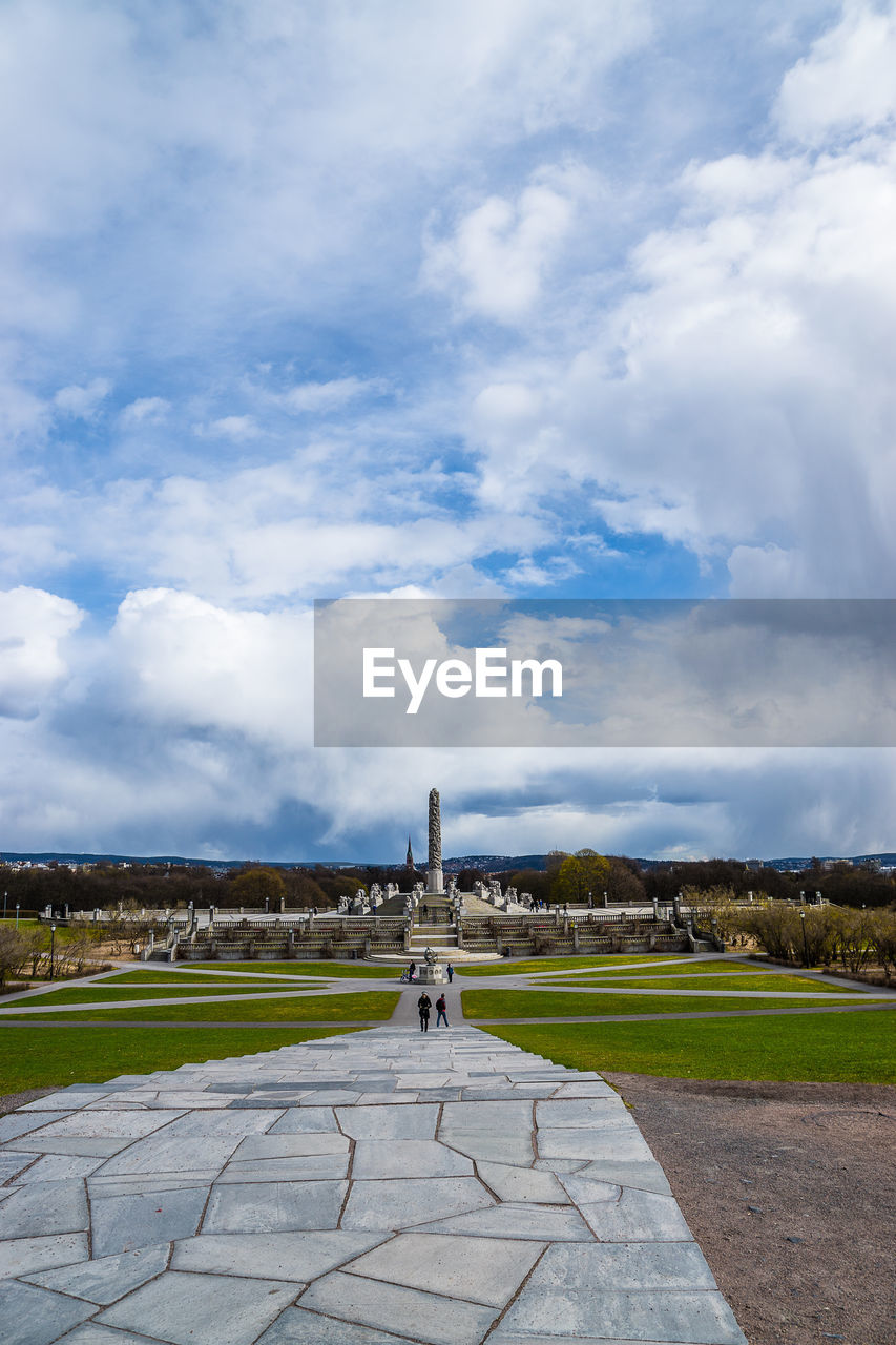 Mid distance view of vigeland sculpture park against sky