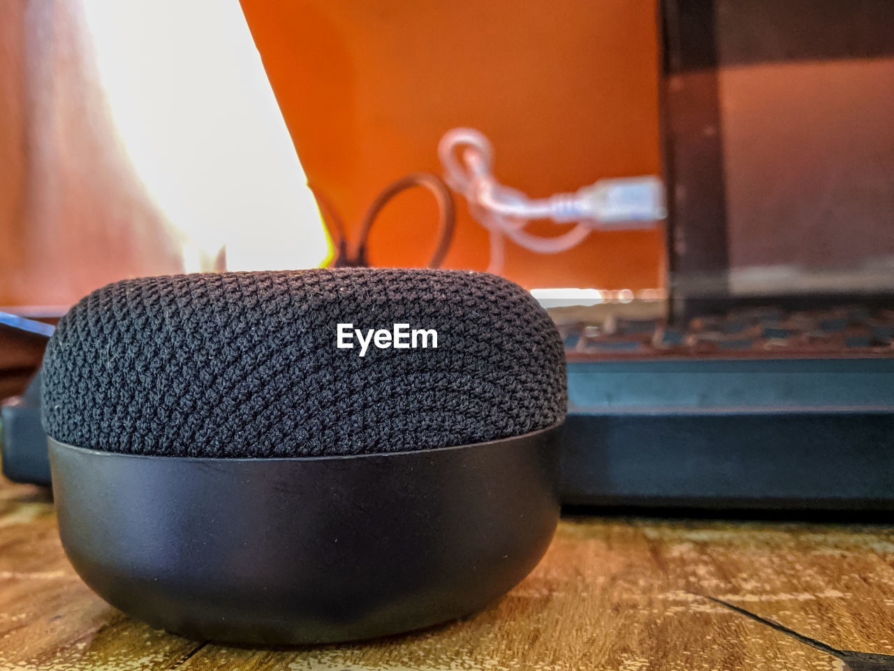 Close-up of speaker on table at home