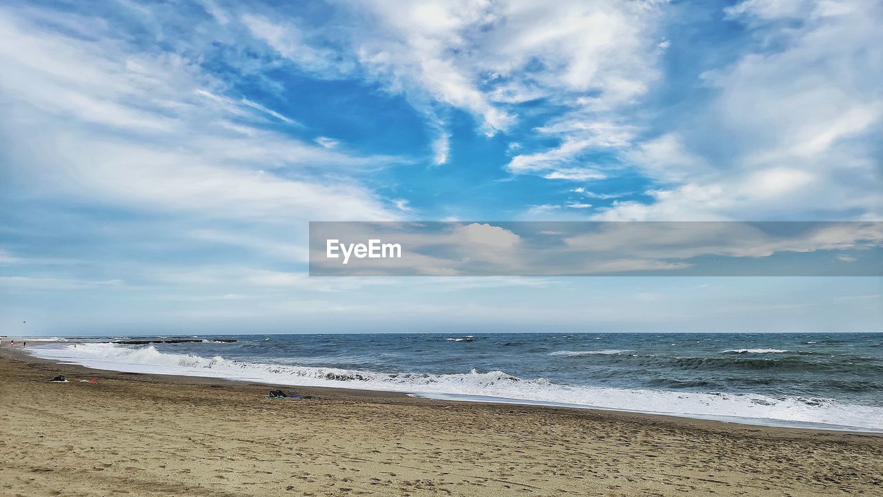 Scenic view of beach against sky