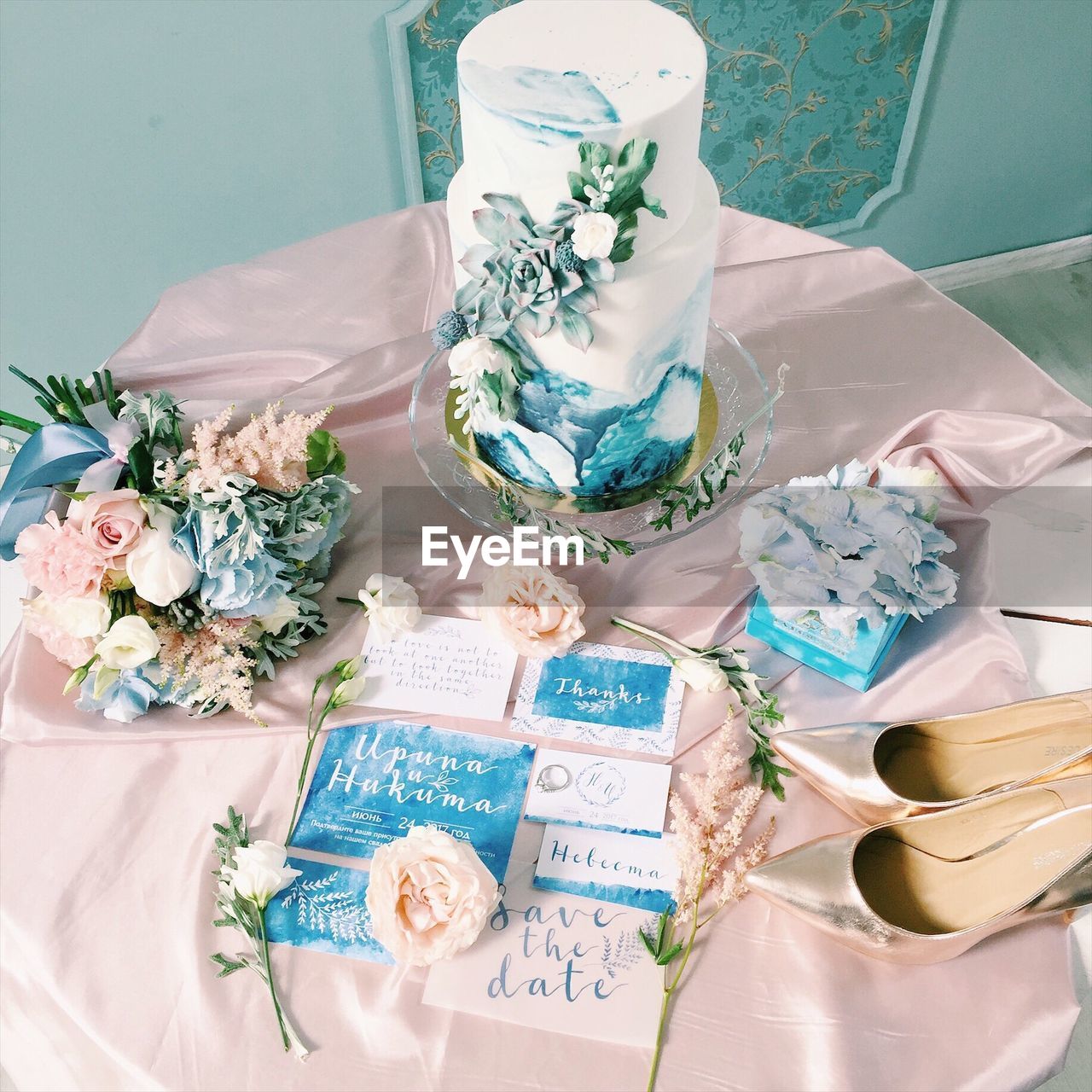 CLOSE-UP OF BOUQUET ON TABLE