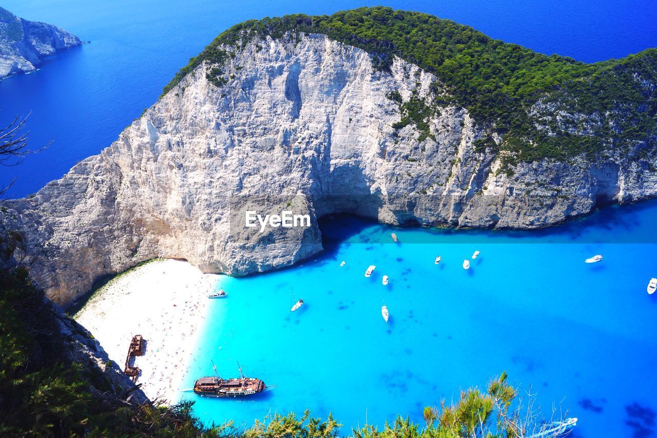 HIGH ANGLE VIEW OF BAY AND ROCKS