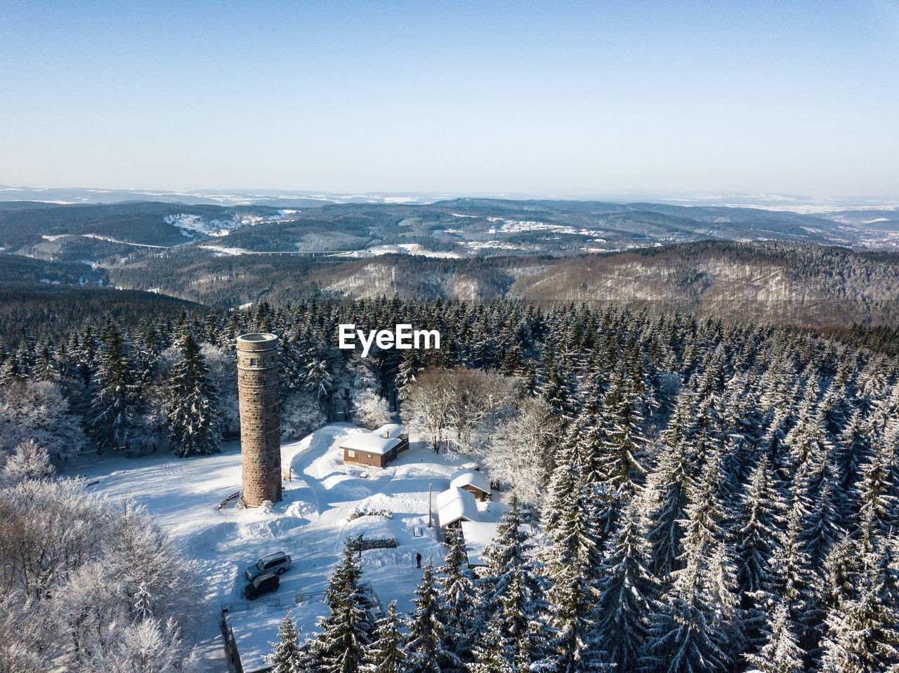 AERIAL VIEW OF FROZEN LANDSCAPE AGAINST SKY