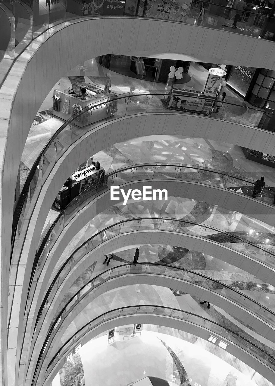 HIGH ANGLE VIEW OF SPIRAL STAIRCASE OF BUILDING