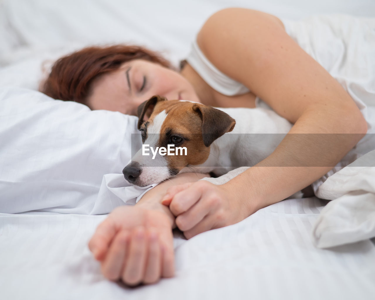 portrait of woman sleeping dog