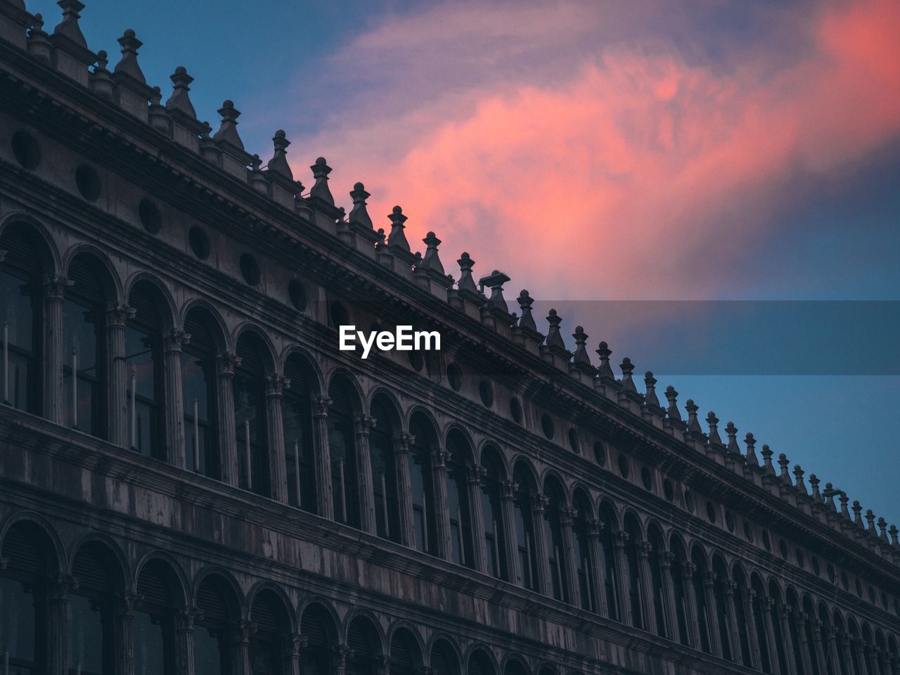 Low angle view of historical building against sky