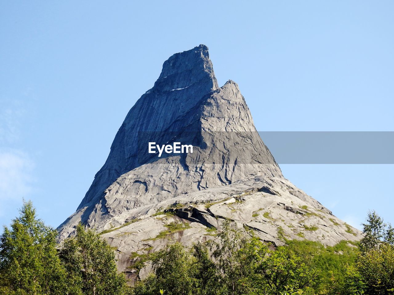 LOW ANGLE VIEW OF ROCK FORMATION AGAINST SKY