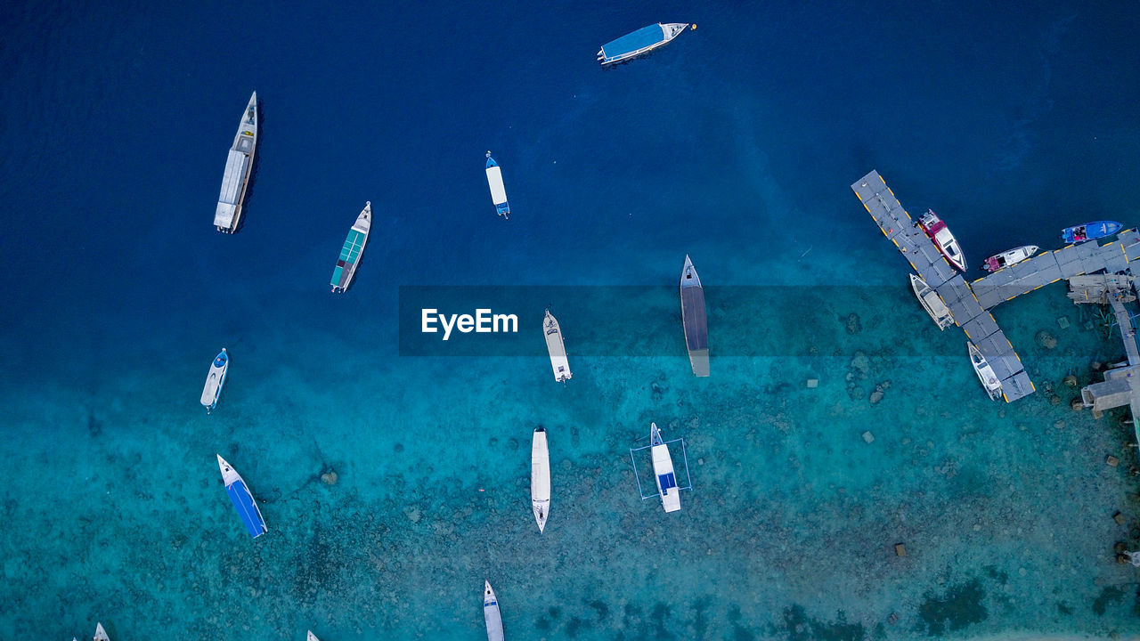 High angle view of sea against blue sky