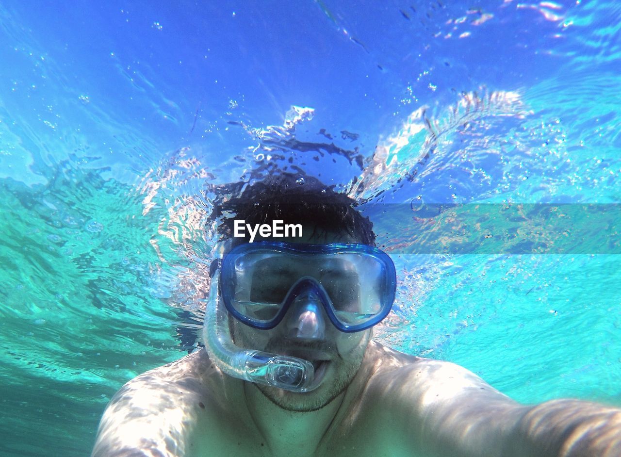 Portrait of man snorkeling in sea