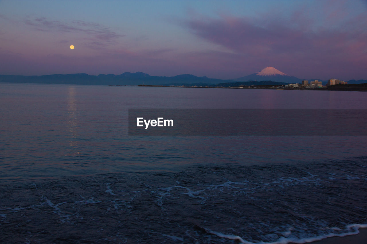 SCENIC VIEW OF SEA DURING SUNSET