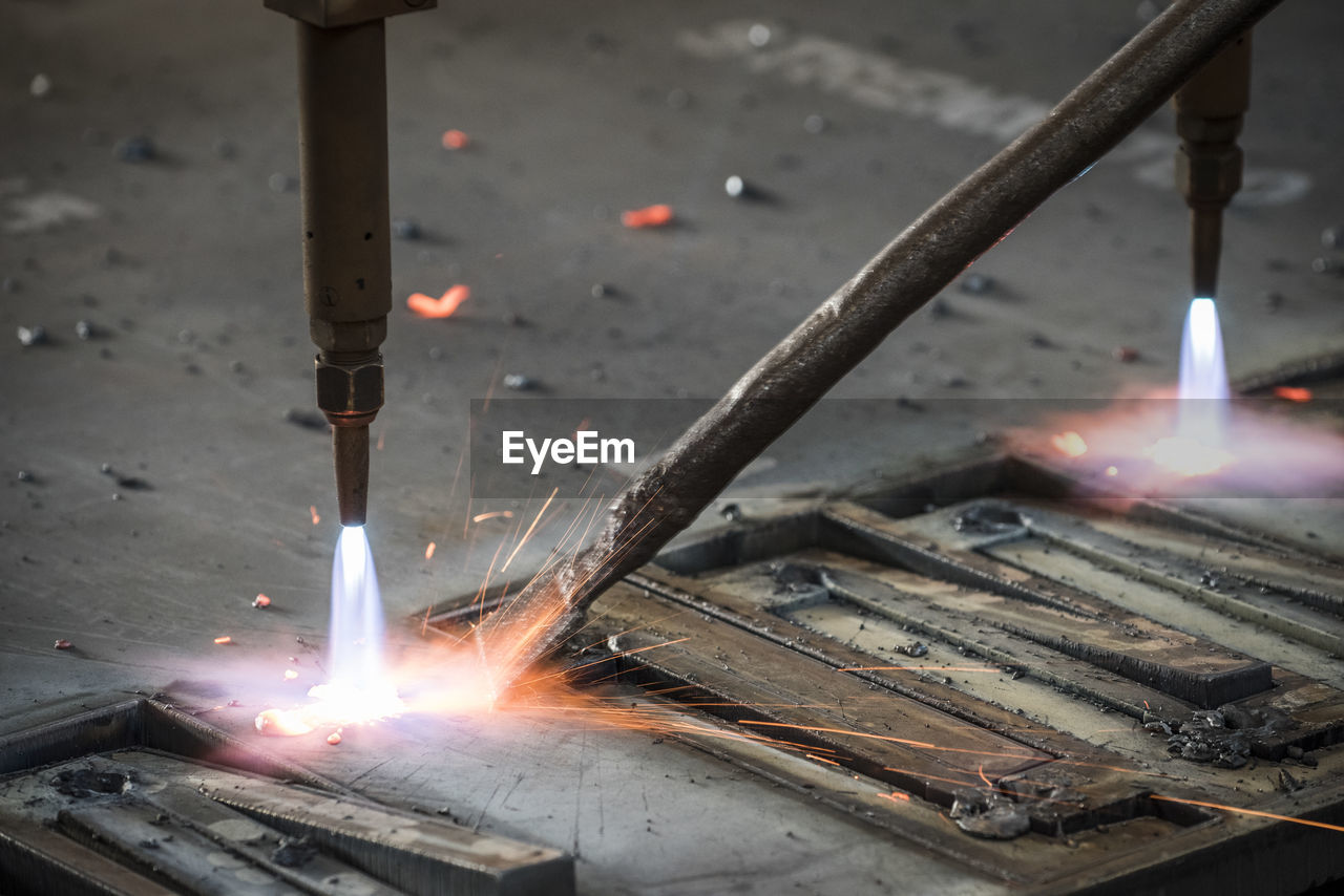 Close-up of fire burning in factory