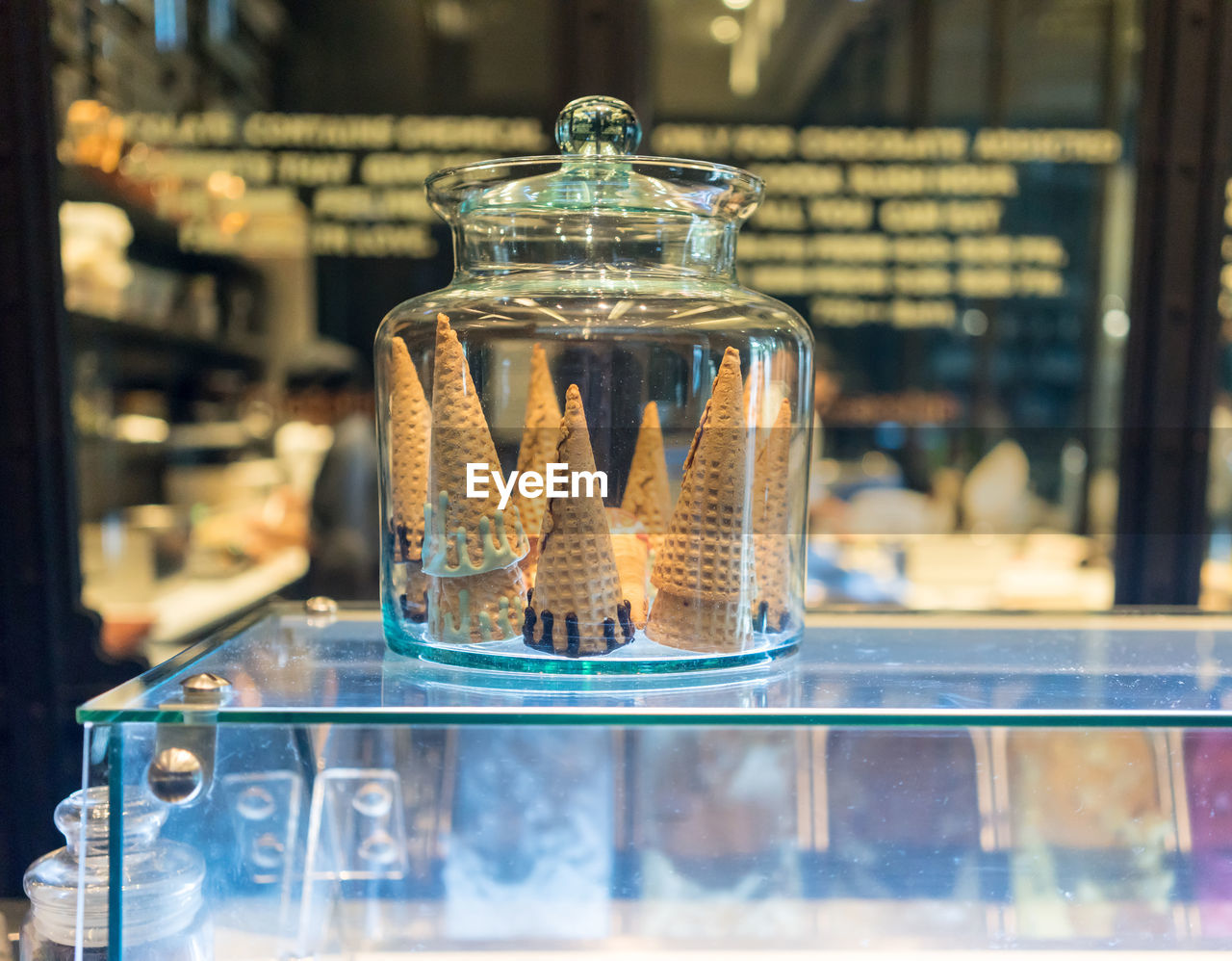 Close-up of ice cream cones on display cabinet