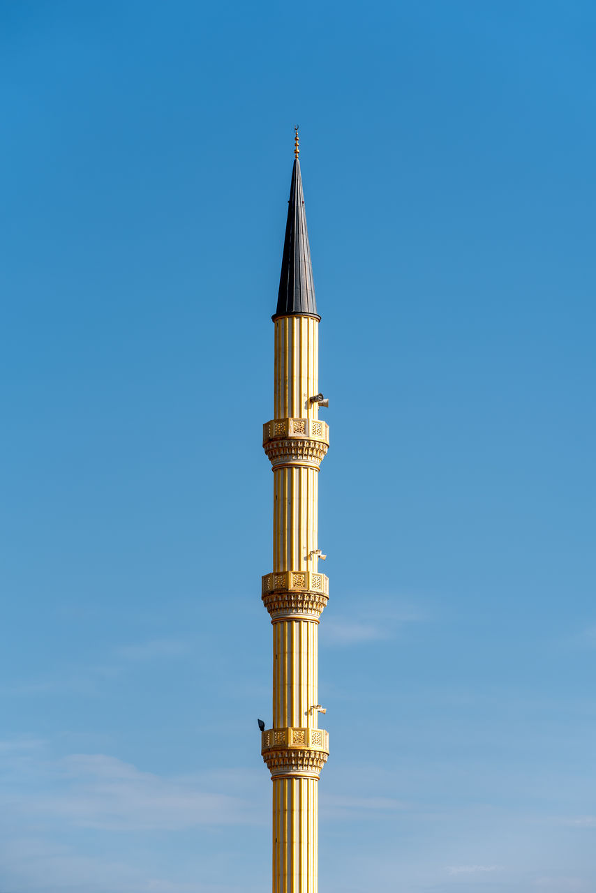 low angle view of mosque against clear blue sky