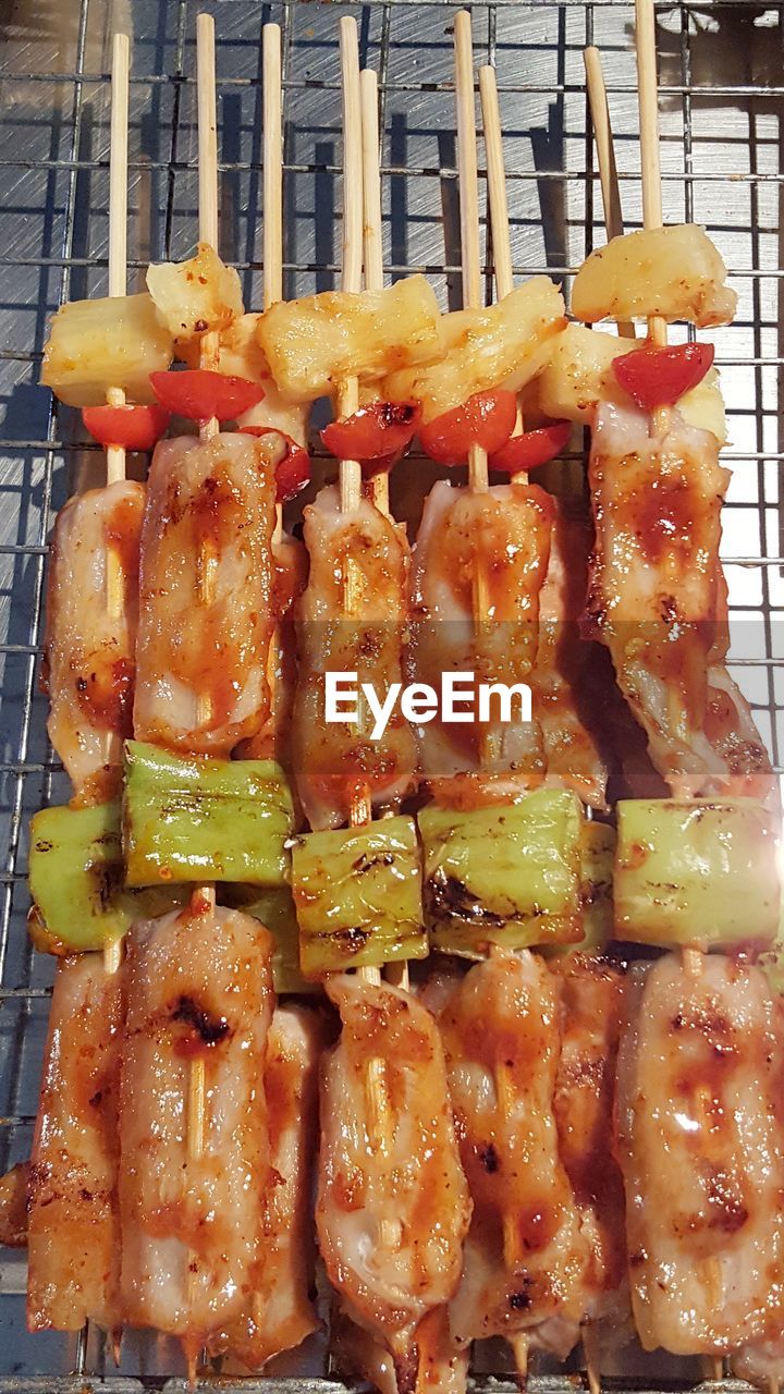 HIGH ANGLE VIEW OF VEGETABLES ON BARBECUE