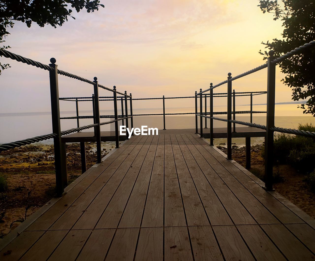 EMPTY FOOTBRIDGE AGAINST SKY