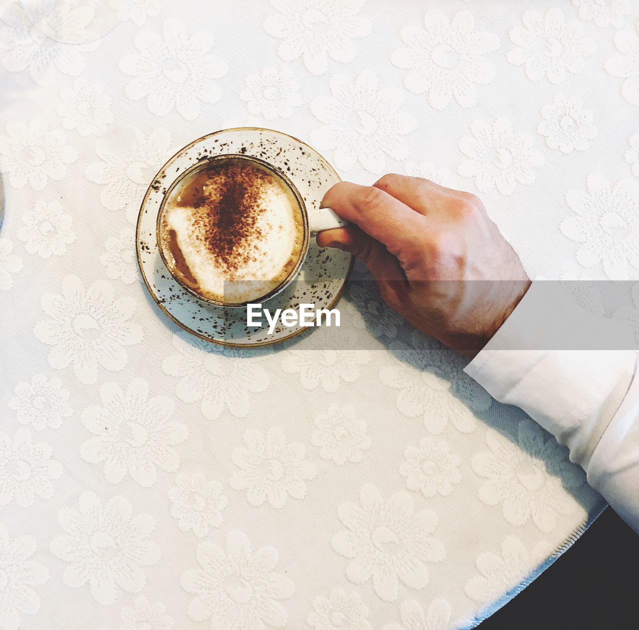 High angle view of coffee cup on table