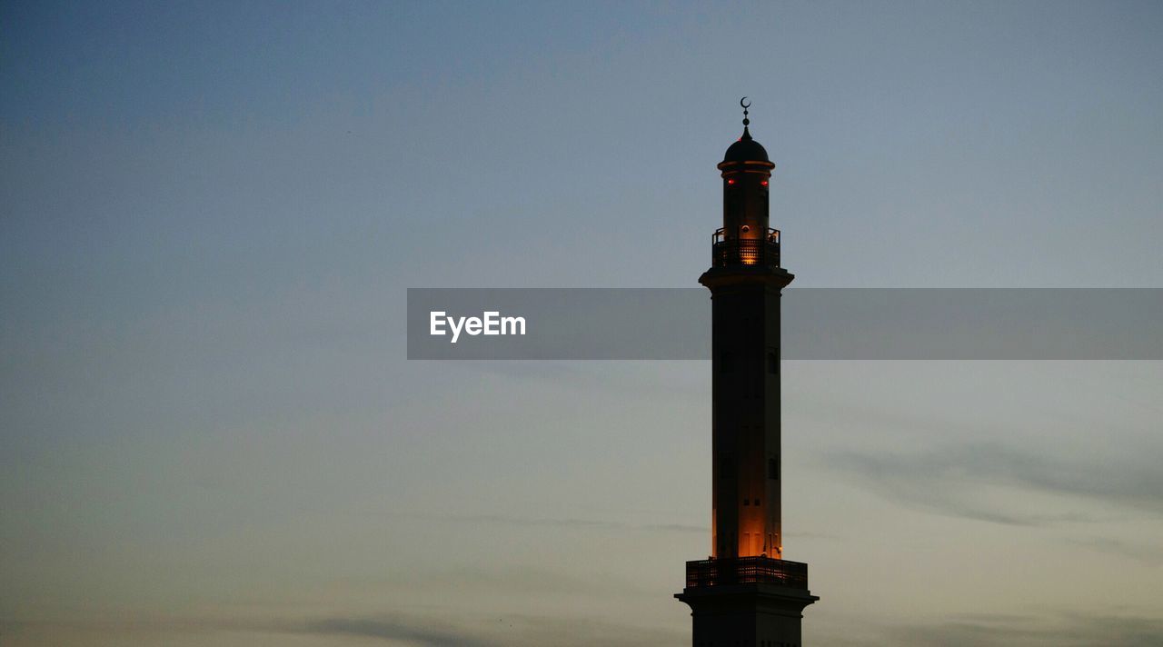 Masjid against sky at night