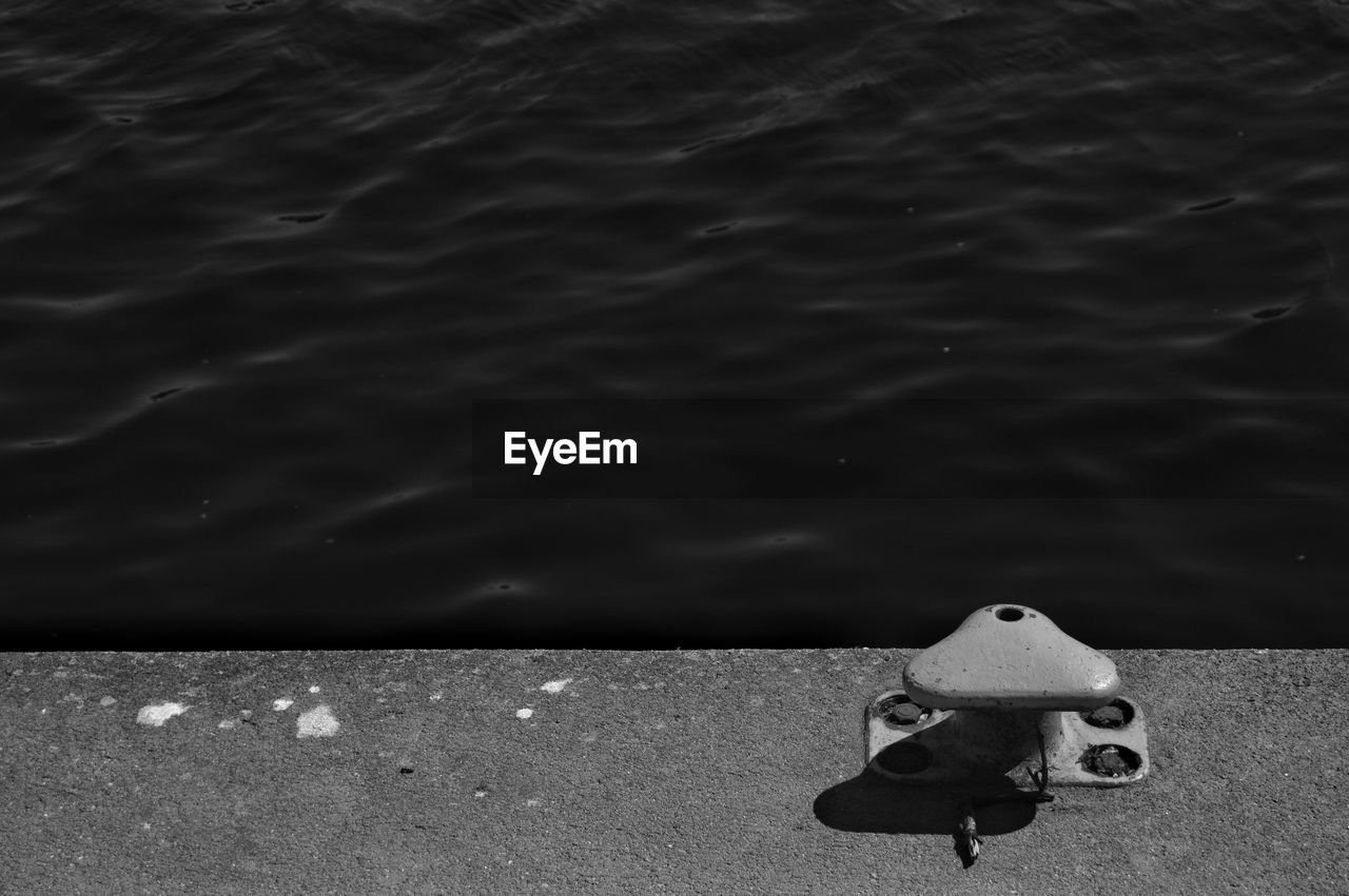 High angle view of person on pier over sea