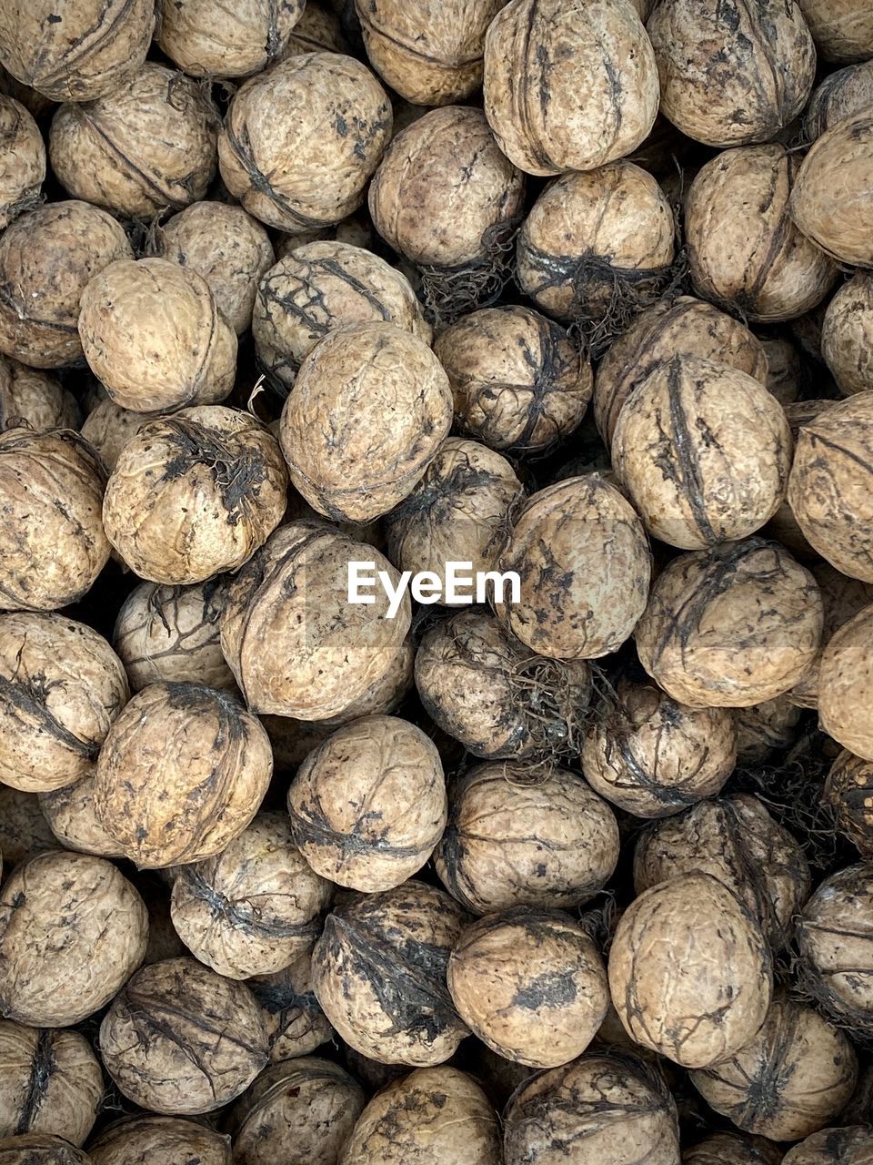 Full frame shot of walnuts for sale at market 