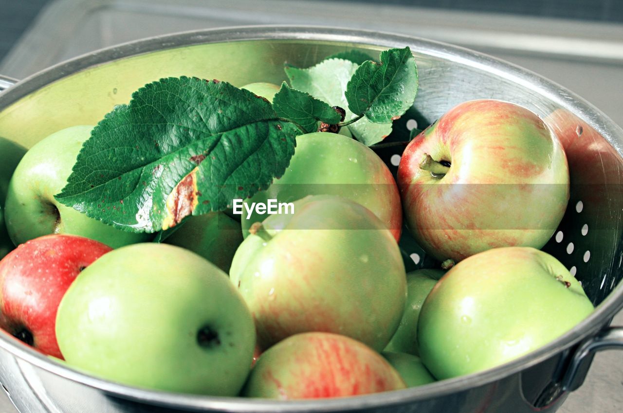 Close-up of apples in container