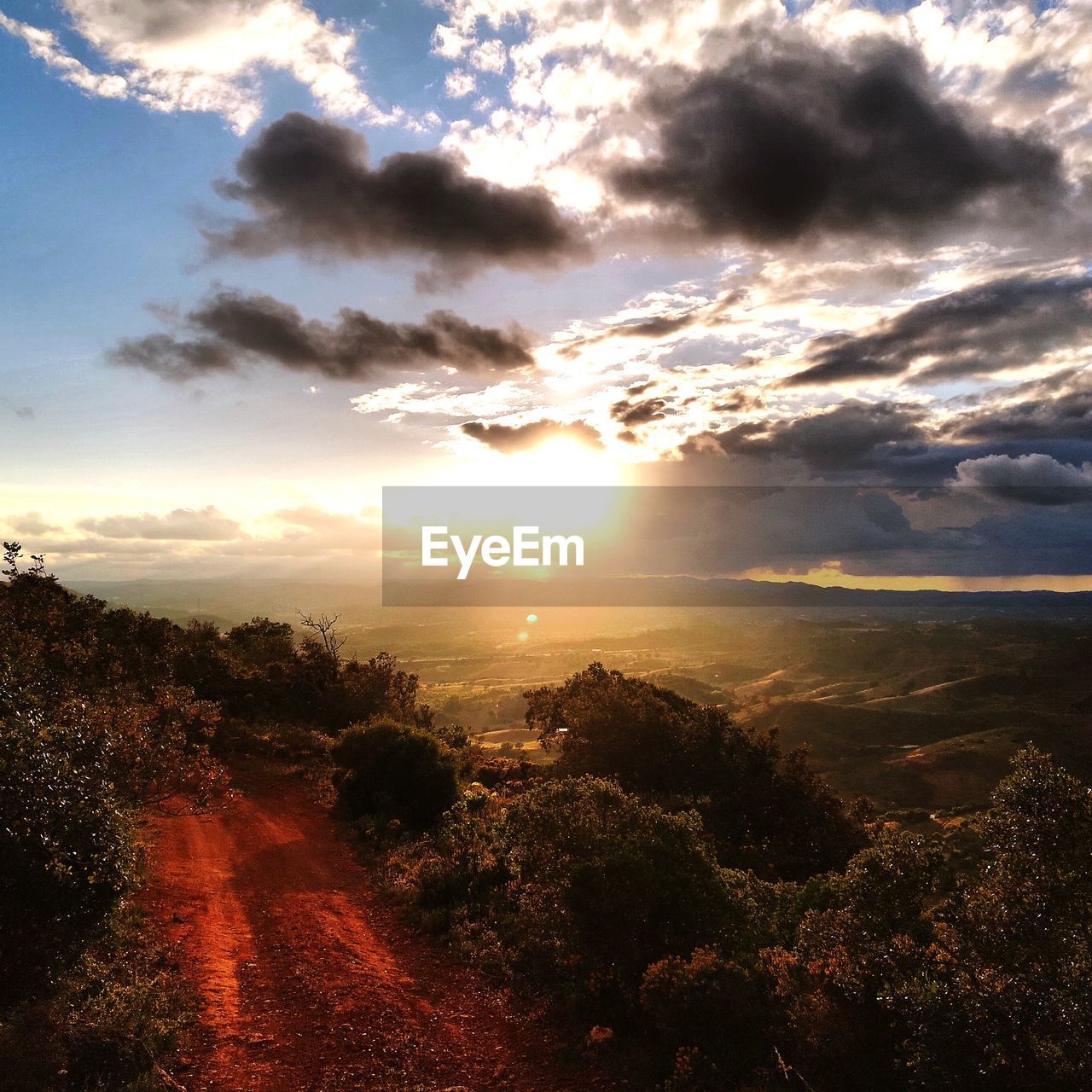 SCENIC VIEW OF LANDSCAPE AGAINST SKY DURING SUNSET