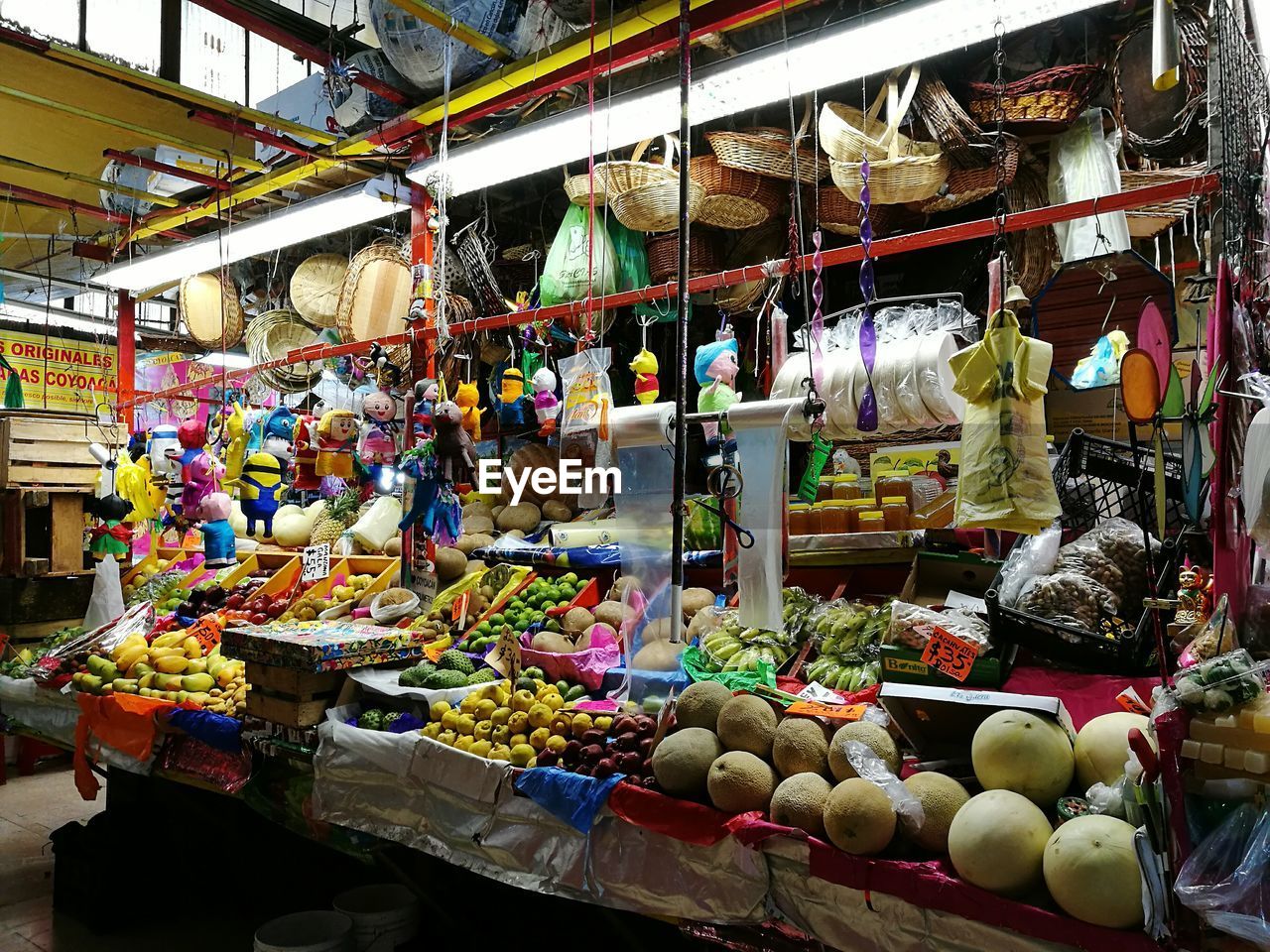 VARIOUS FRUITS FOR SALE IN MARKET STALL