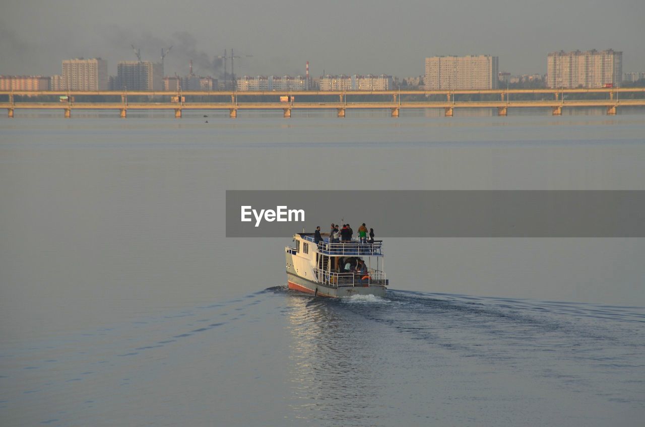 People on ship in sea