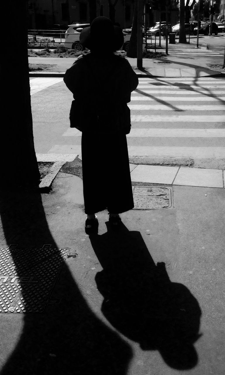 WOMAN WALKING ON STREET