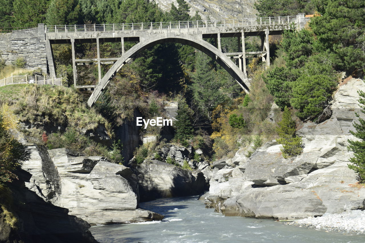 ARCH BRIDGE OVER RIVER