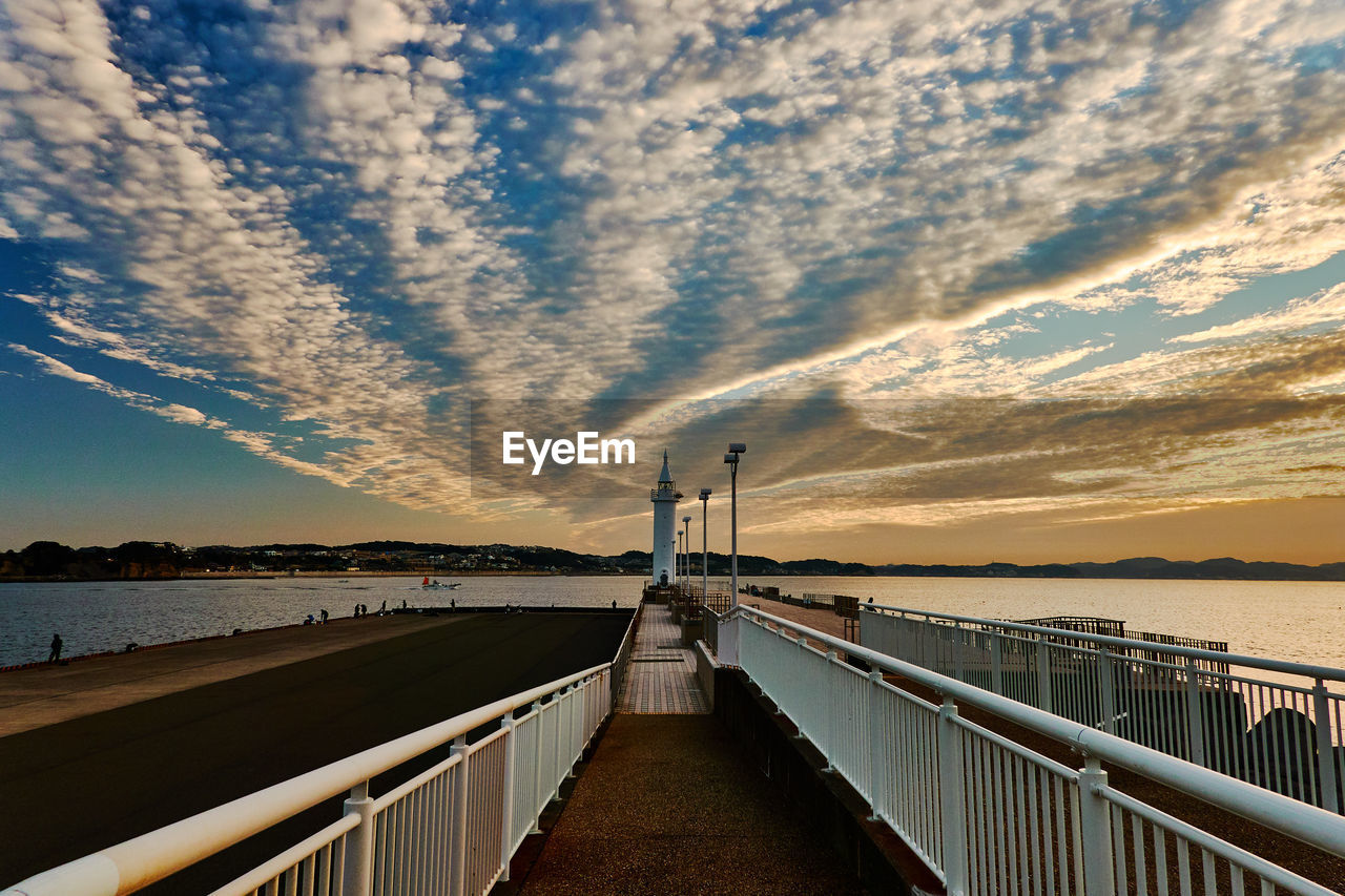 PIER OVER SEA AGAINST SKY