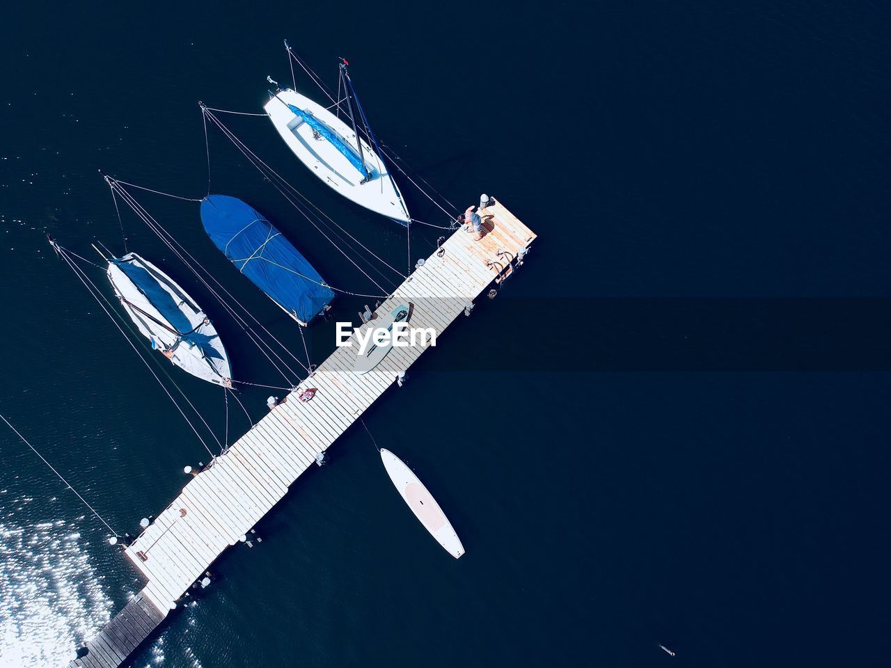 Sailboat in sea from high view angle 