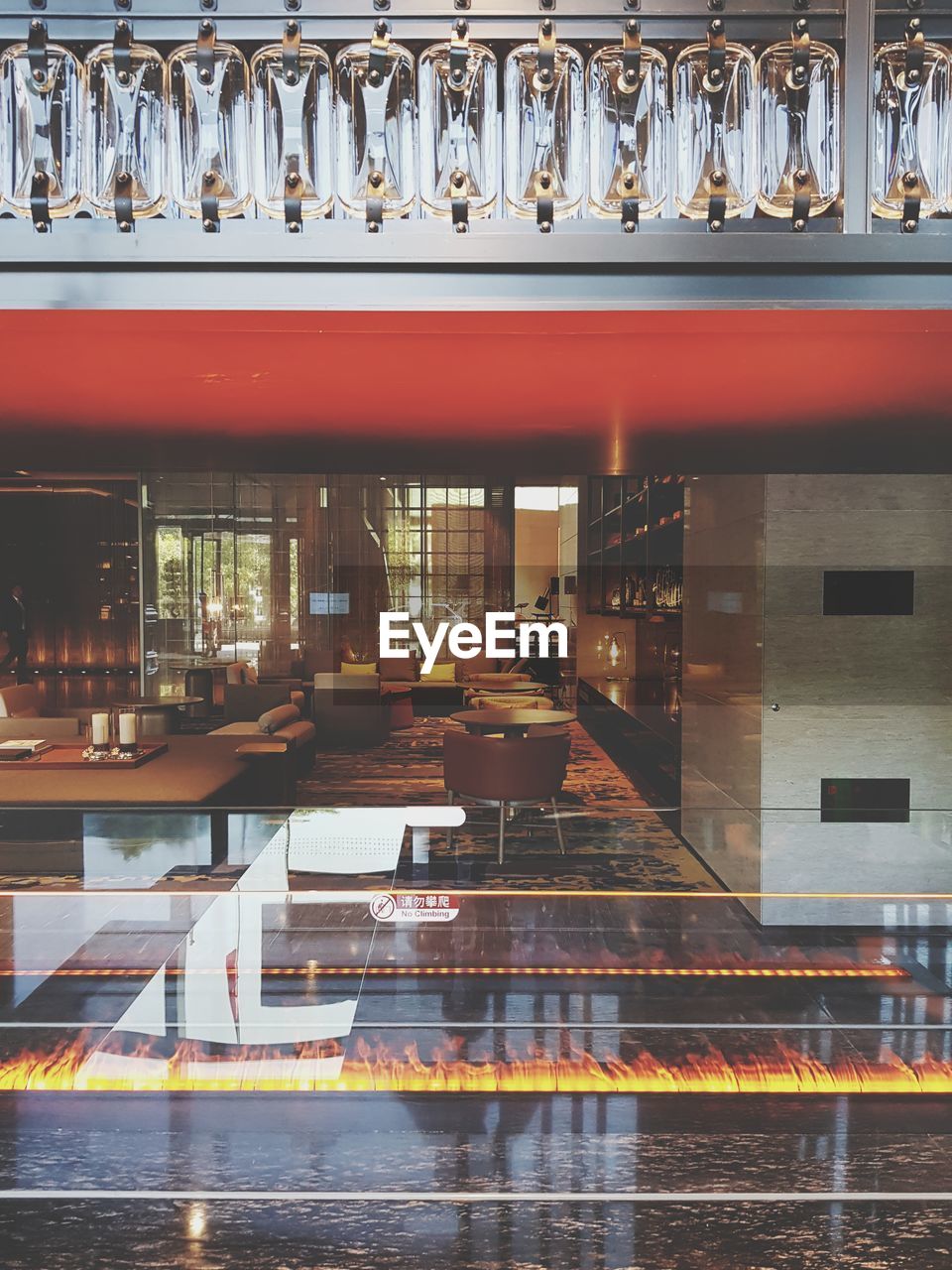 VIEW OF RESTAURANT AND GLASS ON TABLE AT BAR