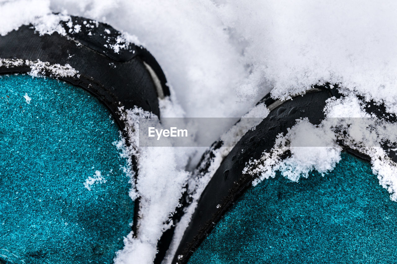 Close-up of waves splashing on sea against sky