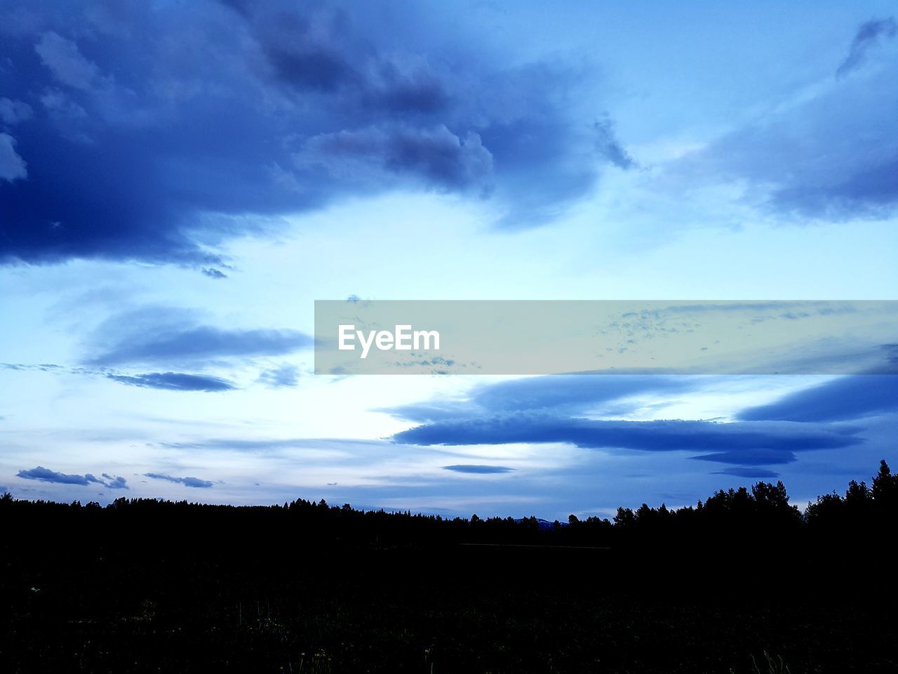 SILHOUETTE LANDSCAPE AGAINST SKY