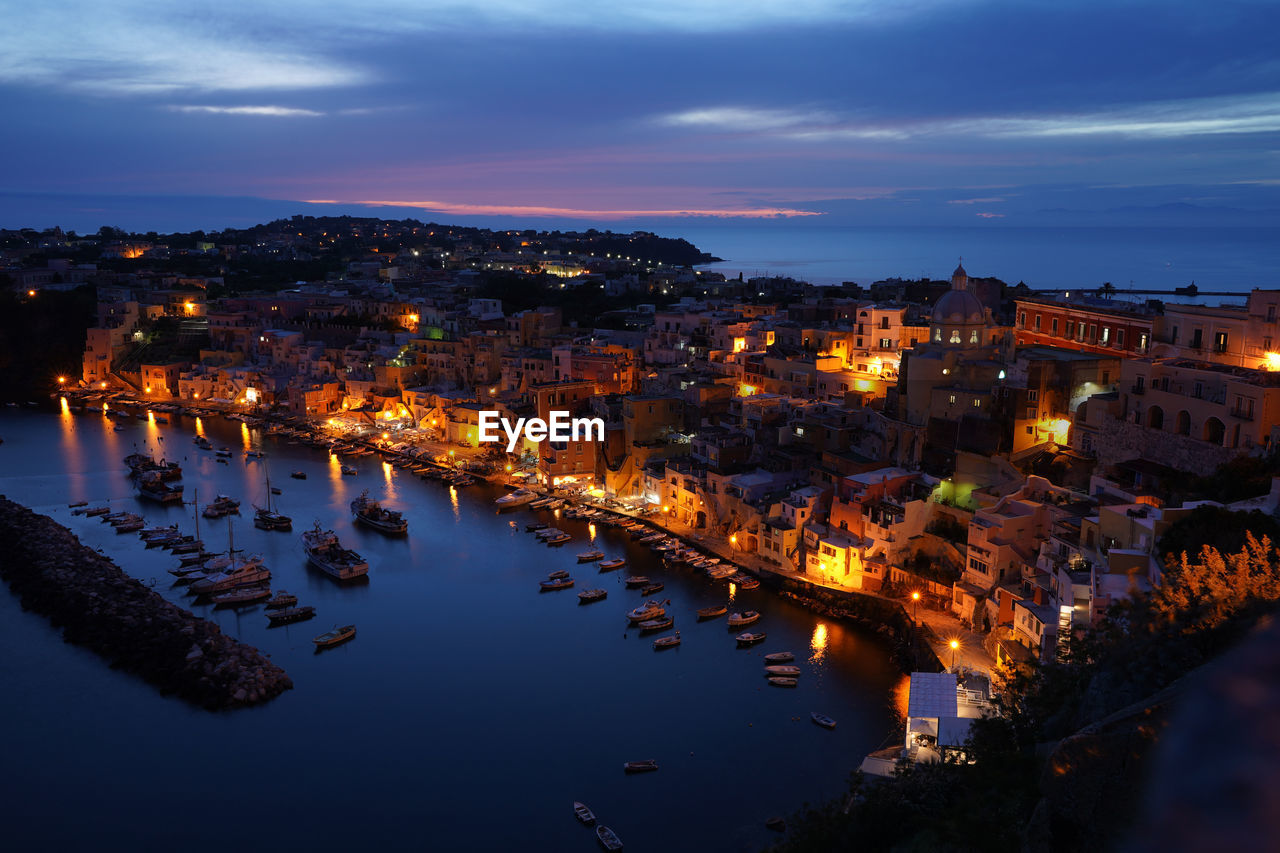 High angle view of illuminated island at night