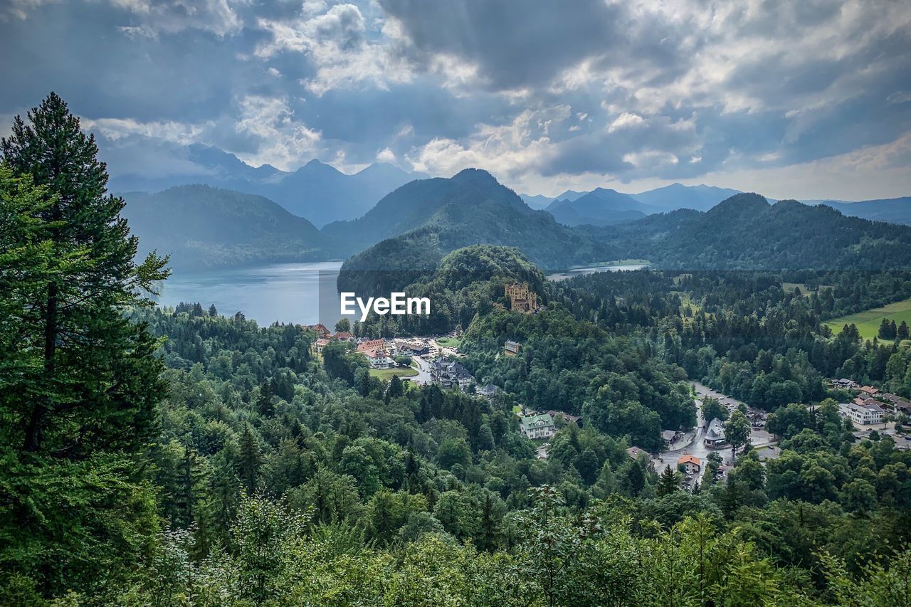 High angle view of trees and mountains against sky